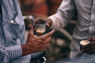 Caring is Sharing - Men sharing a coffee.