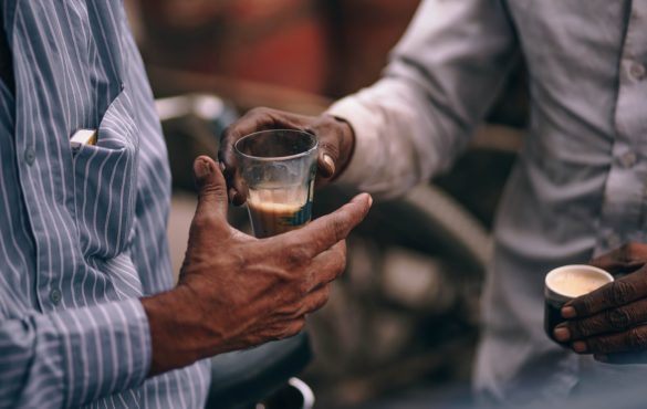 Caring is Sharing - Men sharing a coffee.